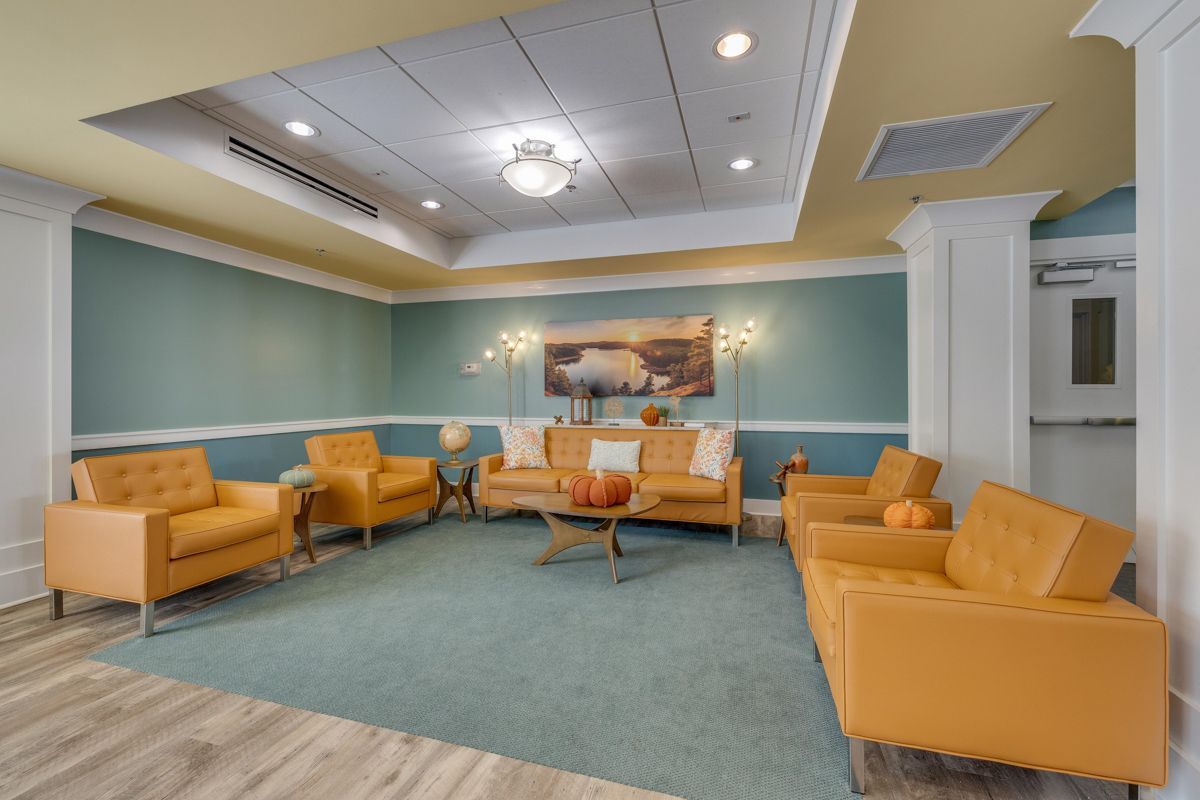 A living room filled with furniture and a couch.