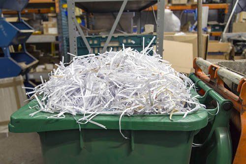 Boxes — Shredded Paper Inside Trash Bin in Sacramento, CA