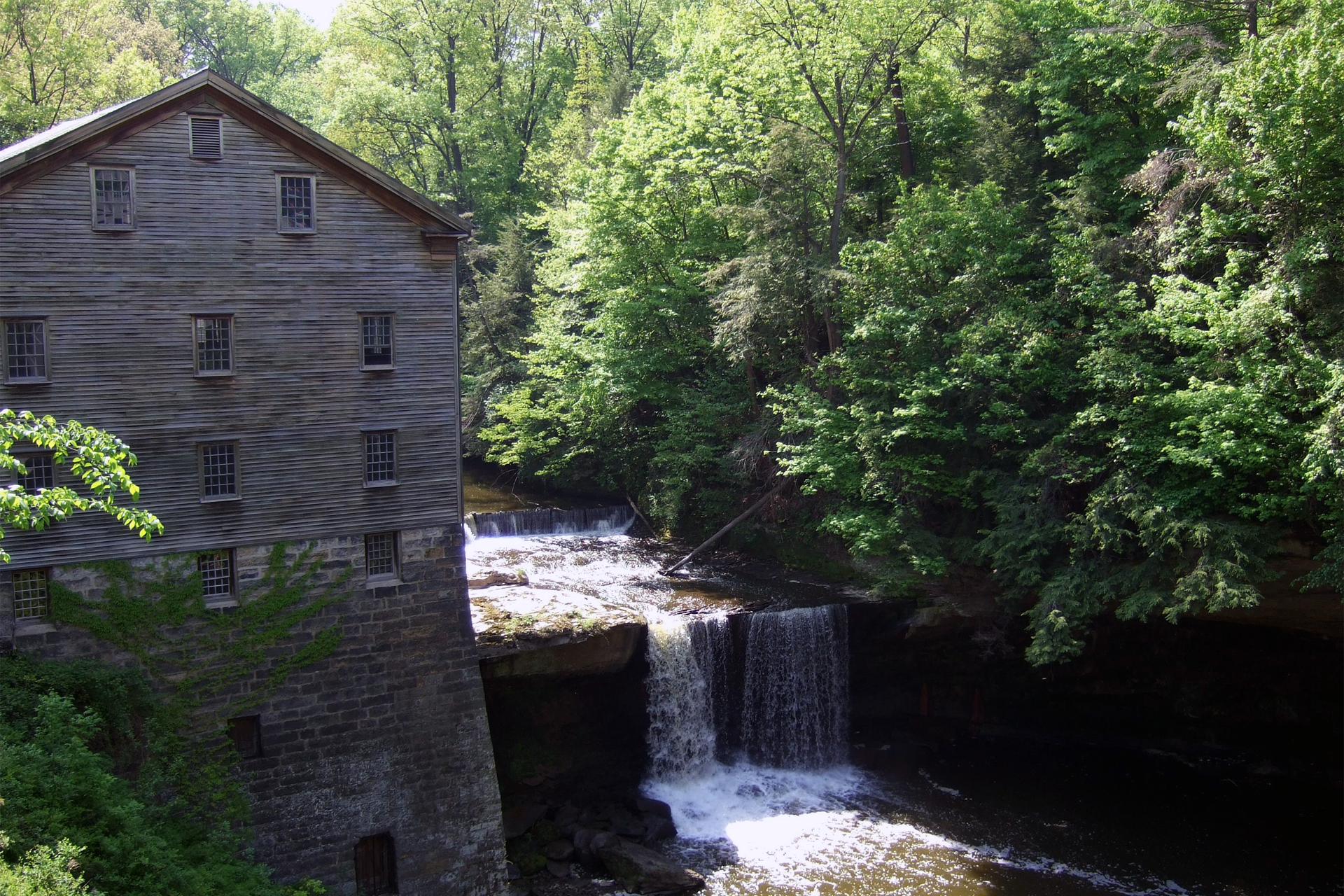 a building with a waterfall in front of it