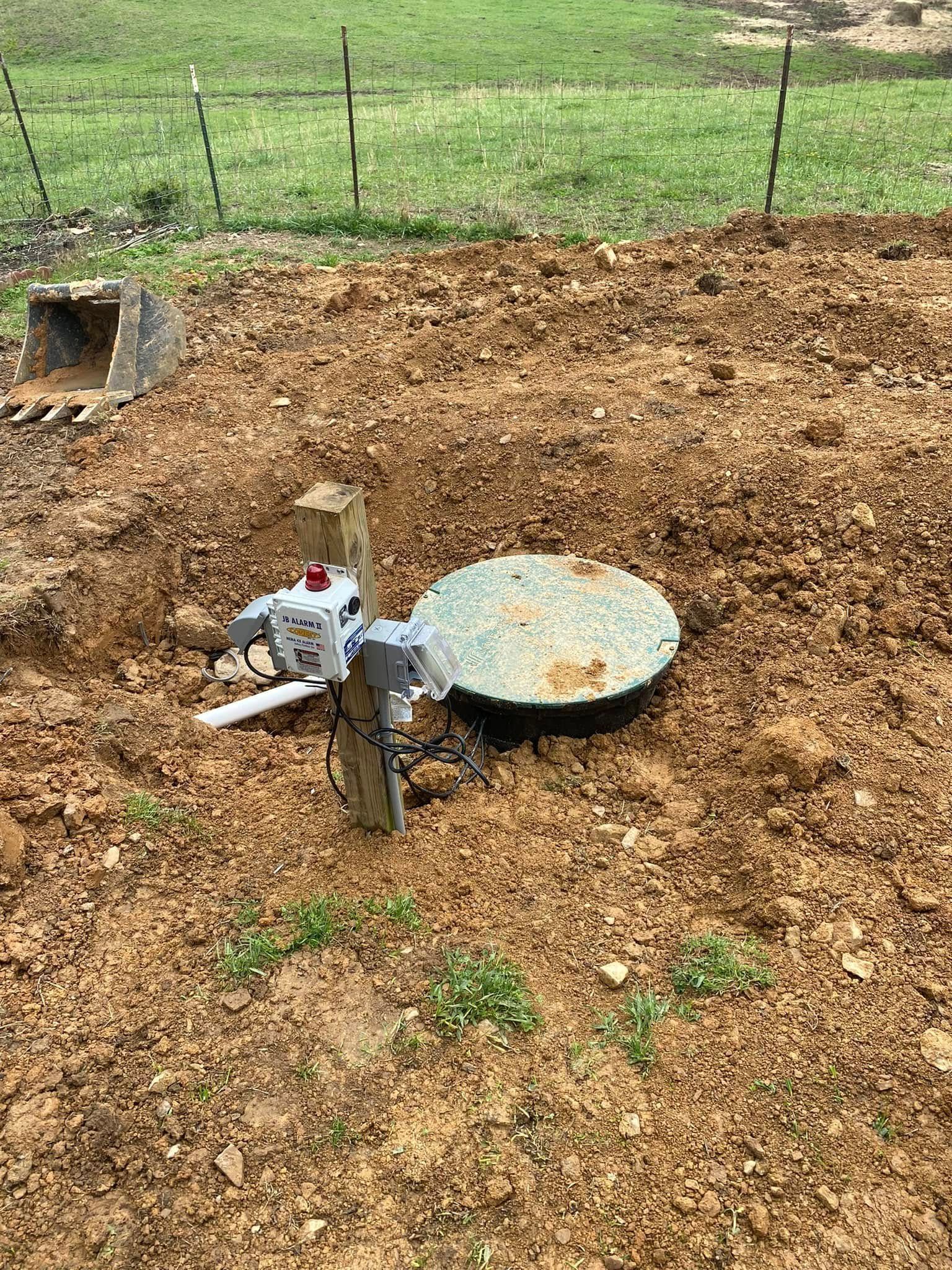 A large house with a lot of windows and a garage on a rainy day.