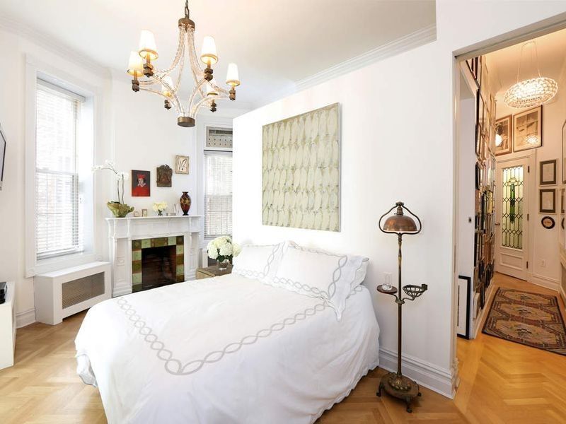 Bedroom with Chandelier Lighting — Brooklyn, NY — Hub Home Improvements