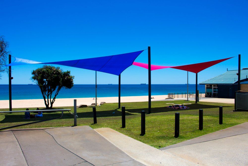 Colorful Bright Red And Blue Shade Sails — Shade Sails In Coolum Beach, QLD