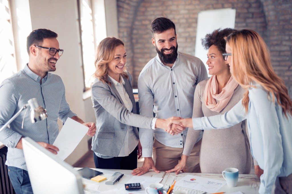 Group shaking hands