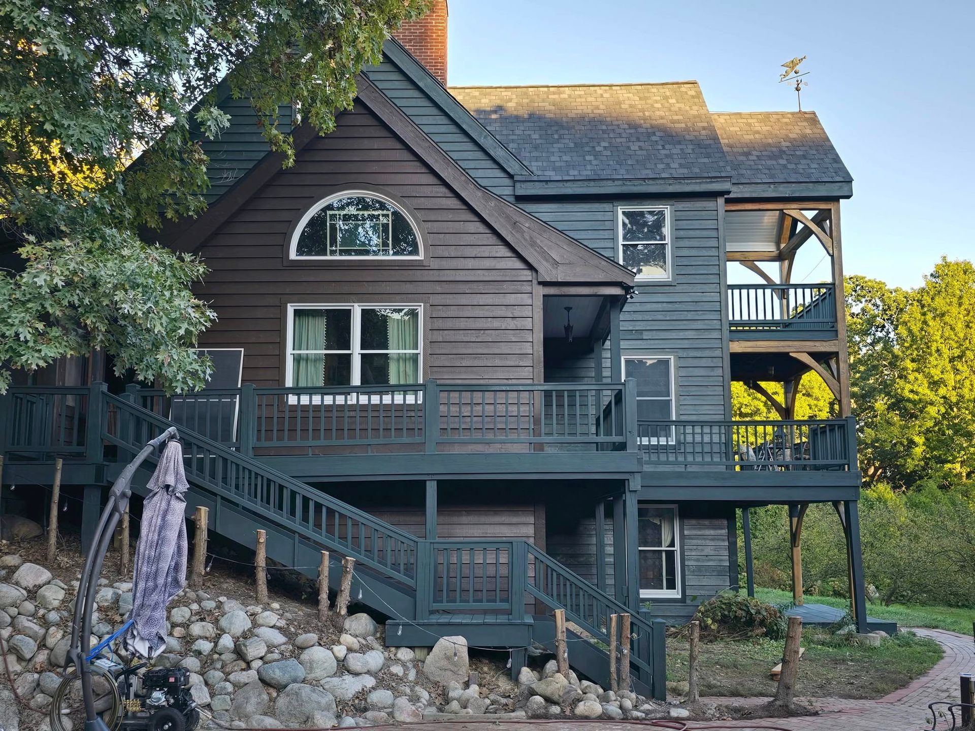 A large house with a lot of windows and stairs