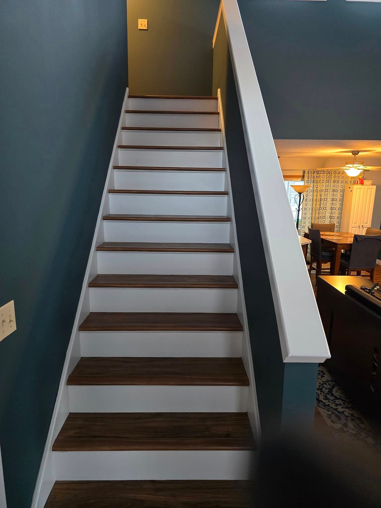 A set of stairs leading up to the second floor of a house.