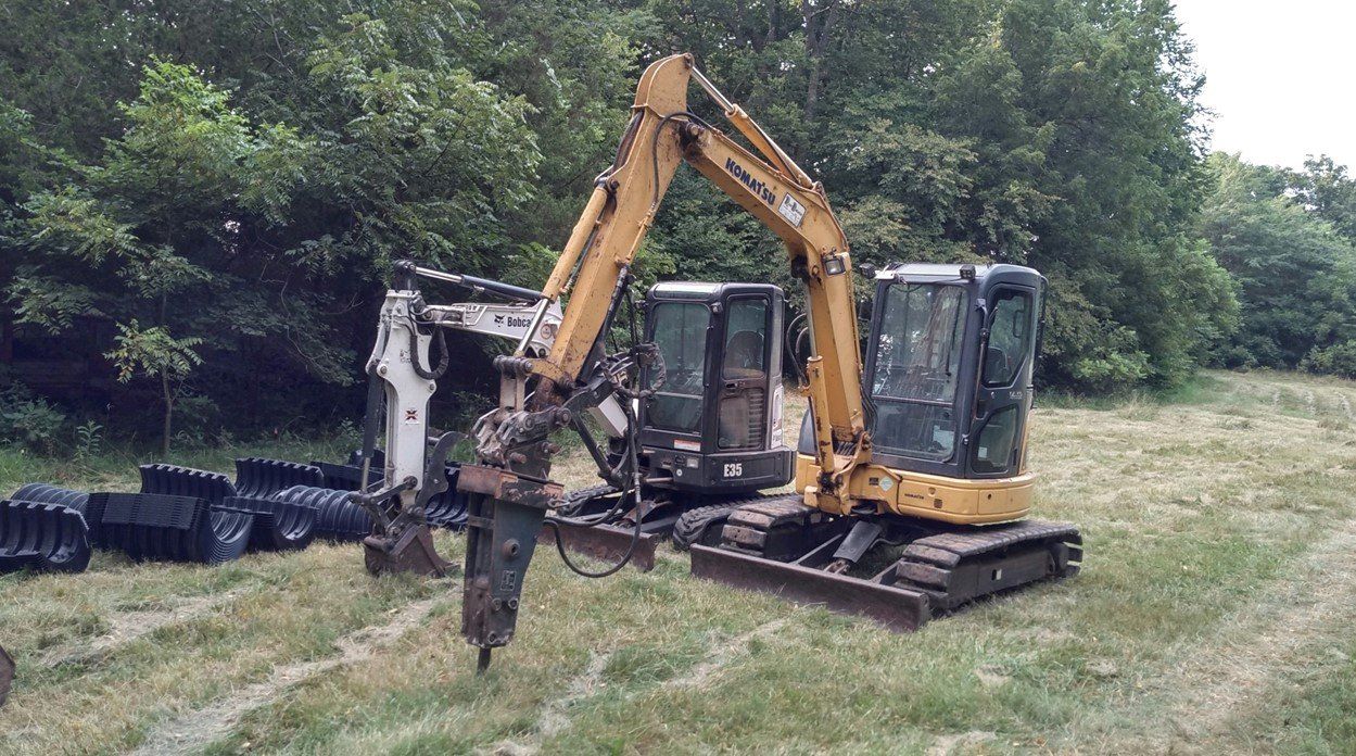 Old Excavator — Deerbourne, MO — Carl’s Septic Tank & Excavating