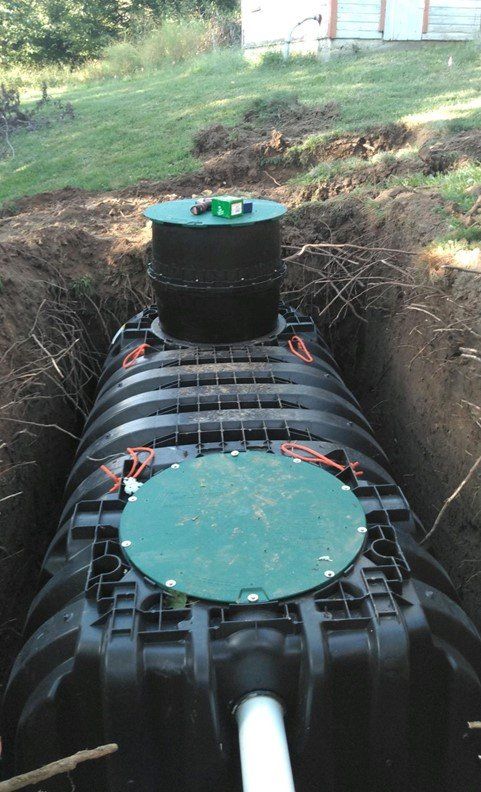 Black Septic Tank — Deerbourne, MO — Carl’s Septic Tank & Excavating