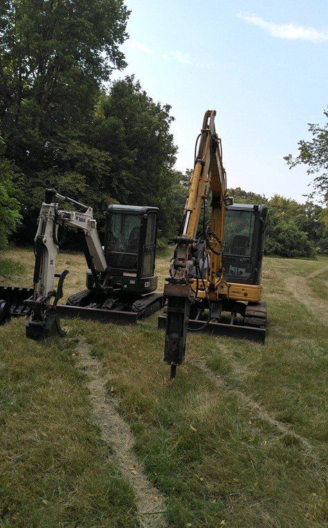 Newly Cleaned Excavator — Deerbourne, MO — Carl’s Septic Tank & Excavating
