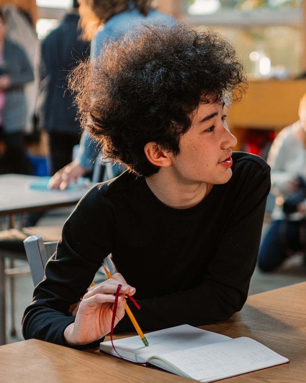 Montessori middle school student  in the classroom