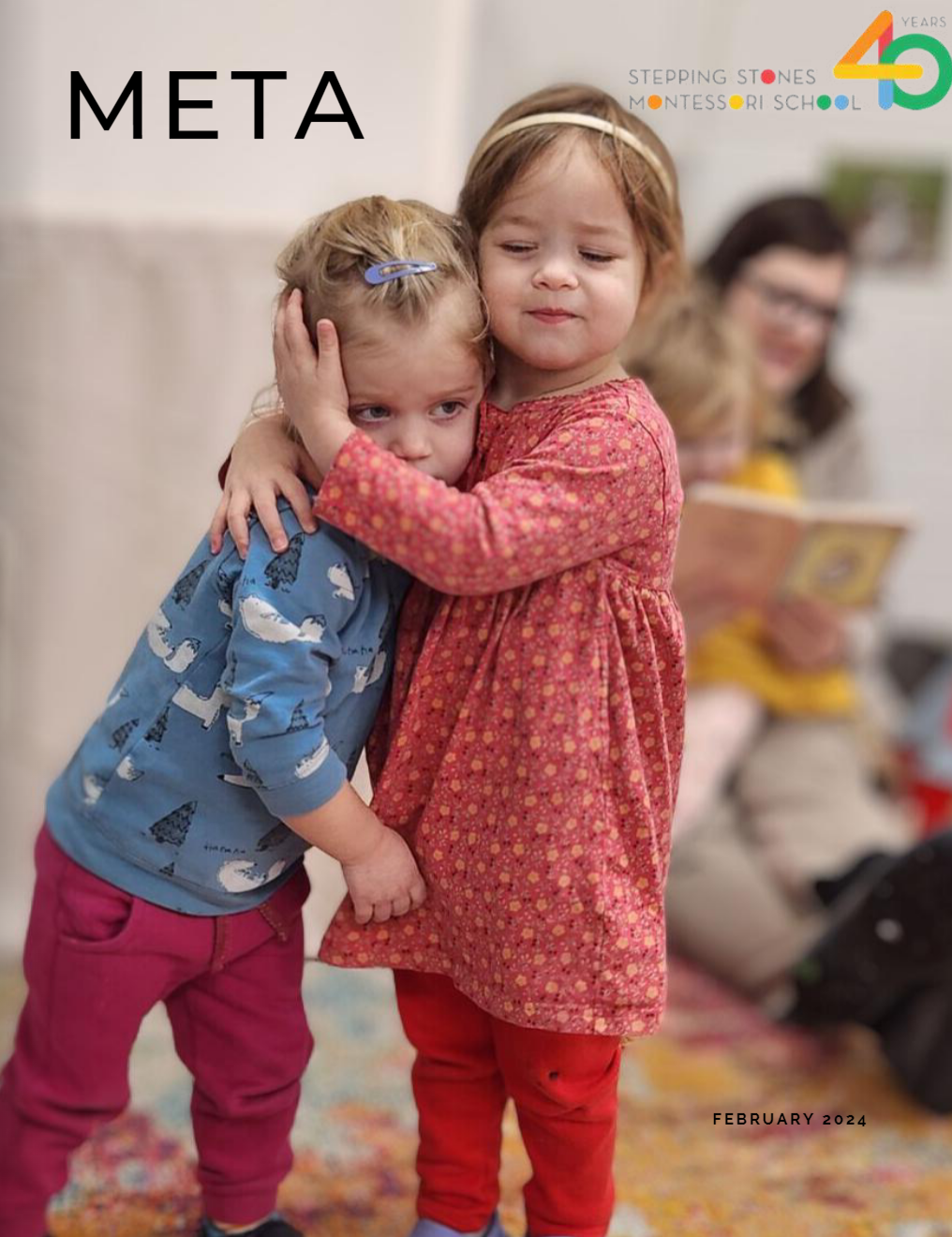 two Montessori children hugging