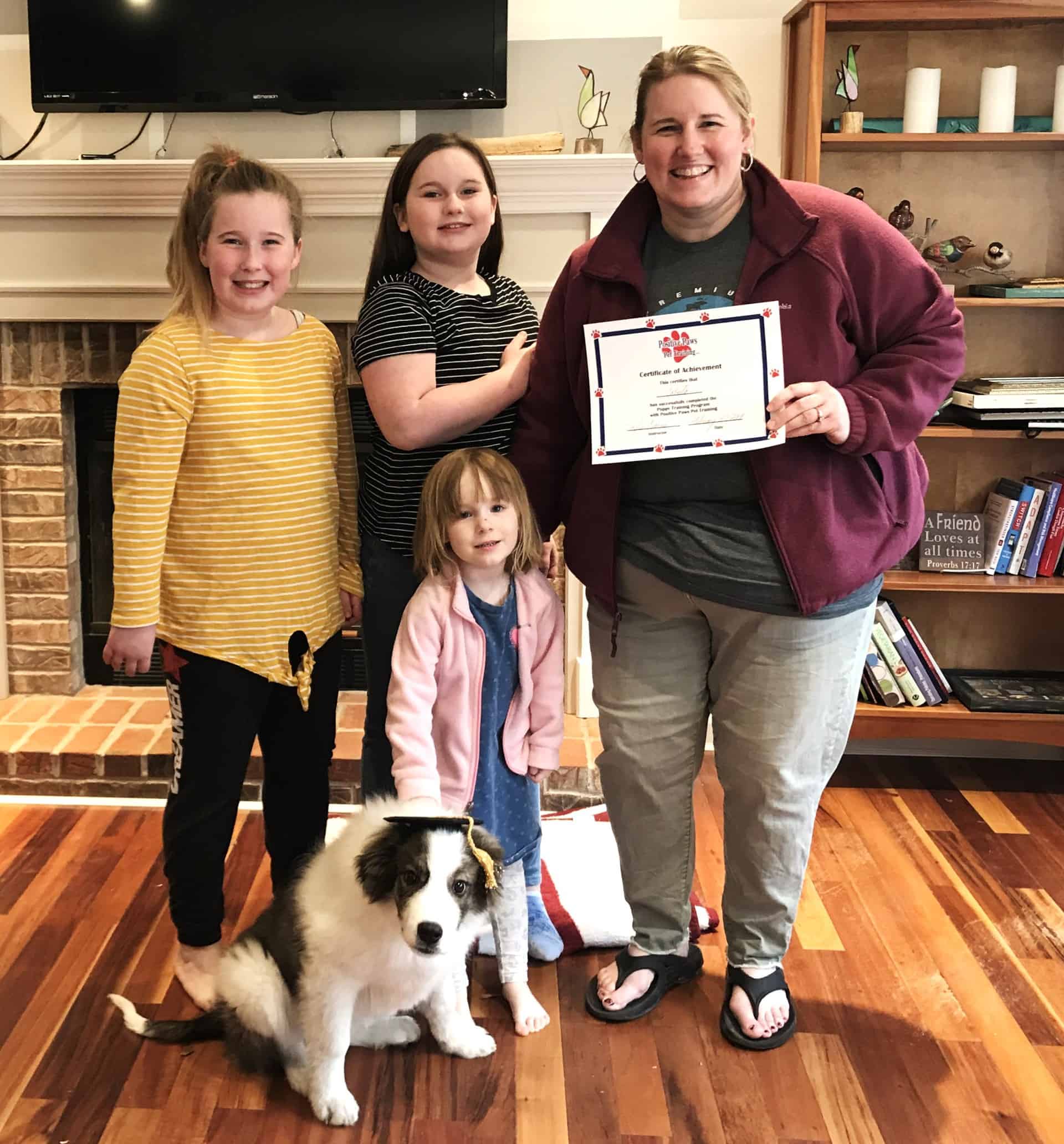 Family And Their Cute Dog — Saint Charles, MO — Positive Paws Pet Training Inc.