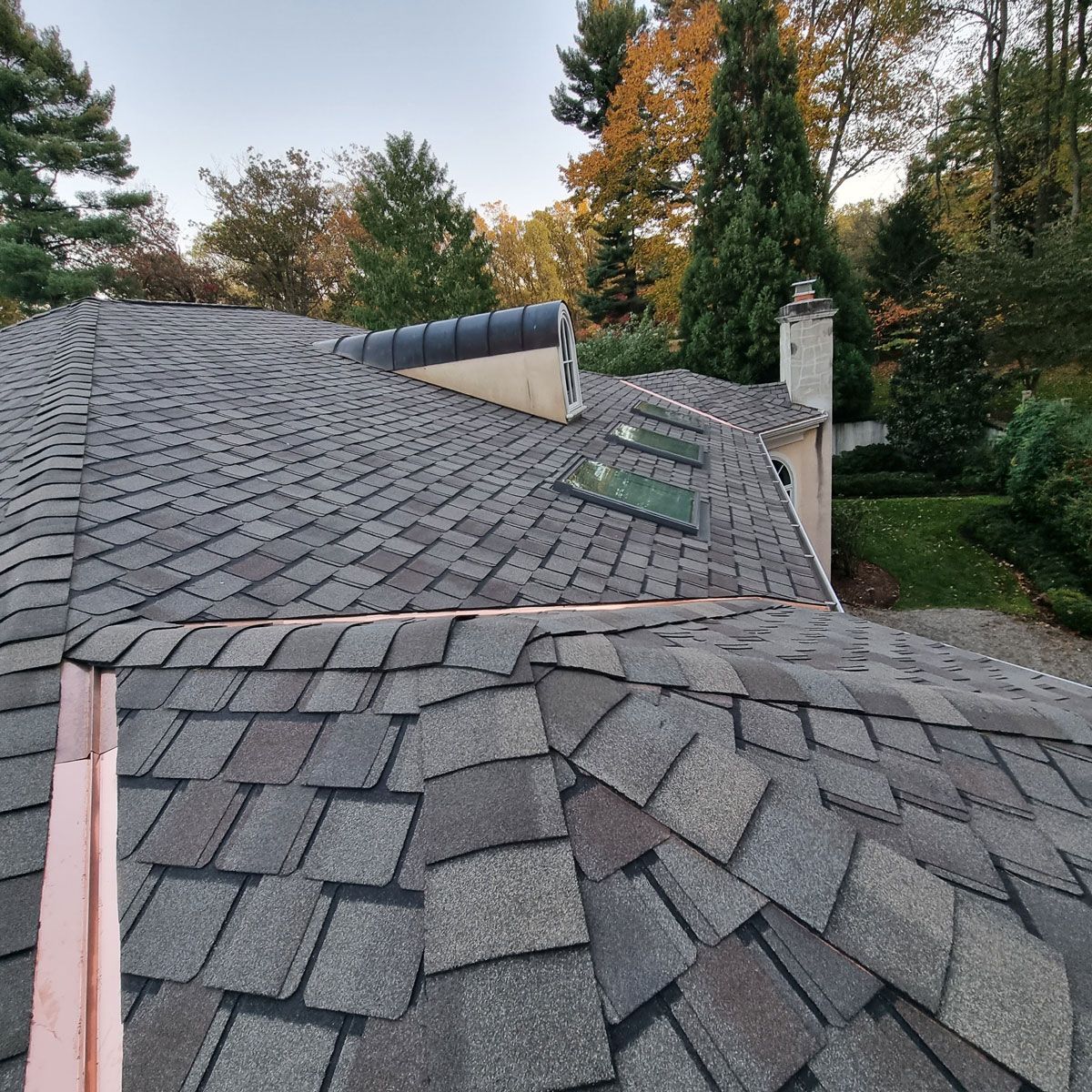 Closeup of a Roof with a Skylight - New Castle, DE - Macedo Mexpro LLC