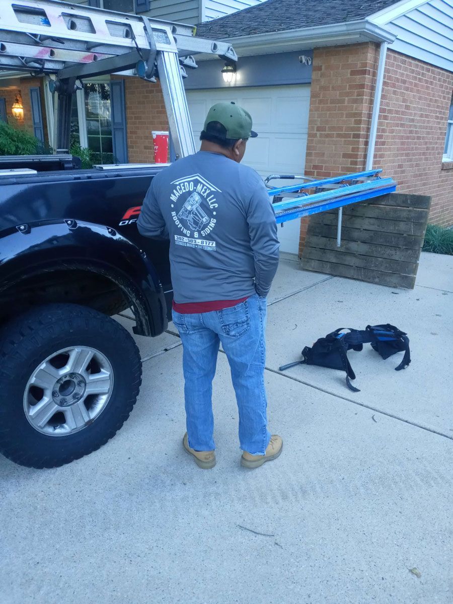 Man in a Gray Shirt Standing Next to a Car - New Castle, DE - Macedo Mexpro LLC