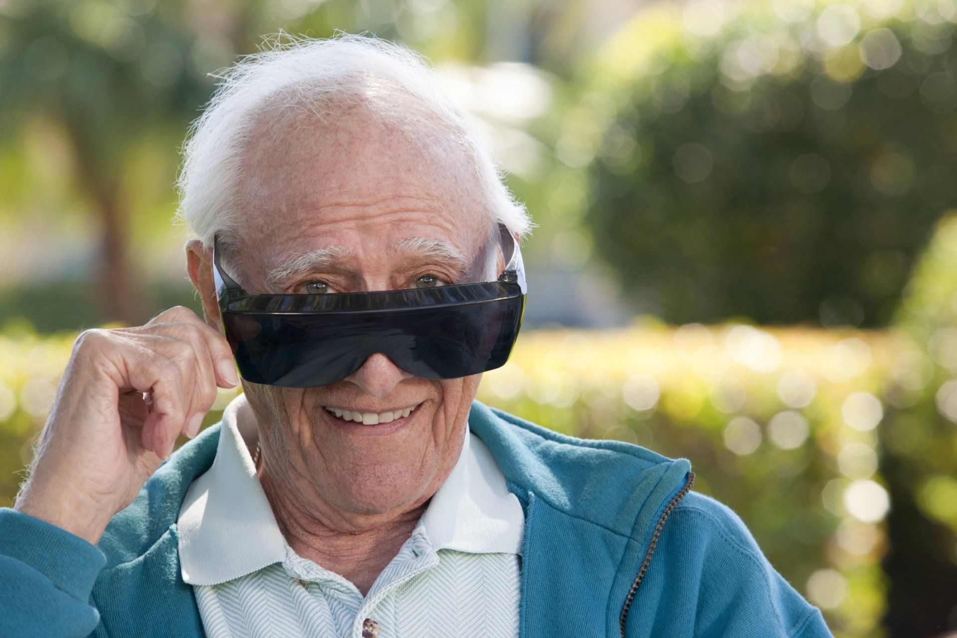 Portrait of a senior man wearing cataract dark glasses - Gainesville, FL - Eye Associates of Gainesville