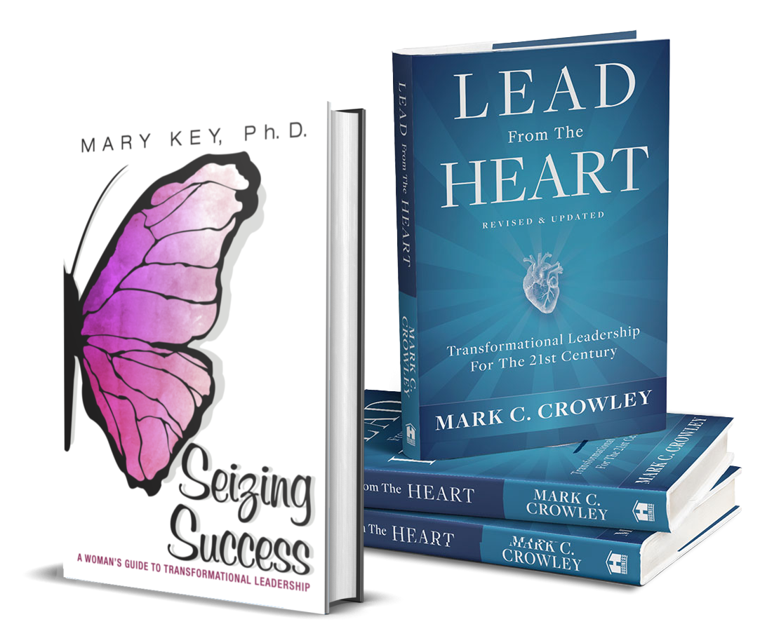 A stack of books titled lead the heart and seizing success
