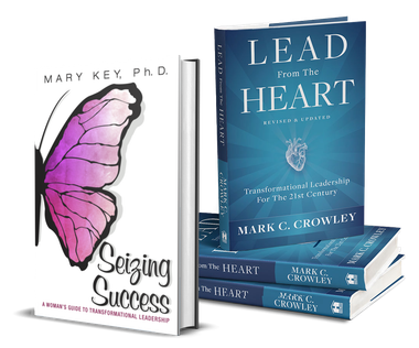 A stack of books titled lead the heart and seizing success