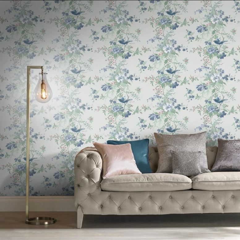 sofa and floral wallpaper