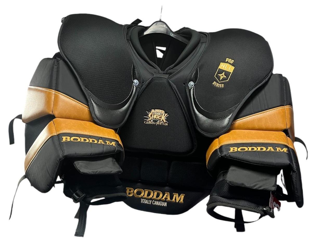 A black catcher 's chest protector with red lettering on it