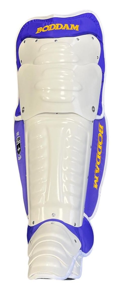A pair of red , white and blue shin guards on a white background