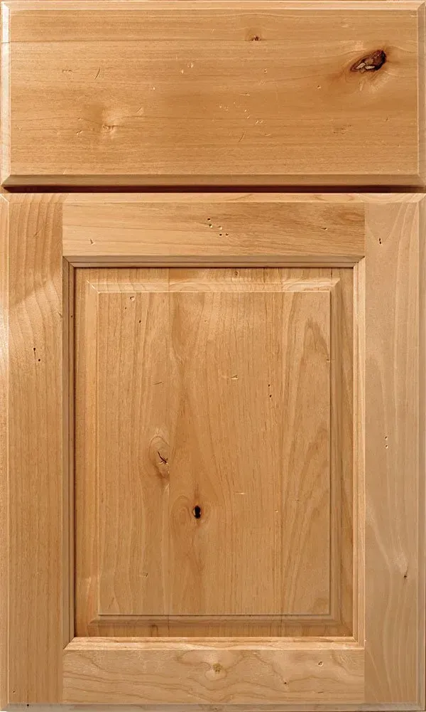Light wood kitchen cabinet door with raised panel.