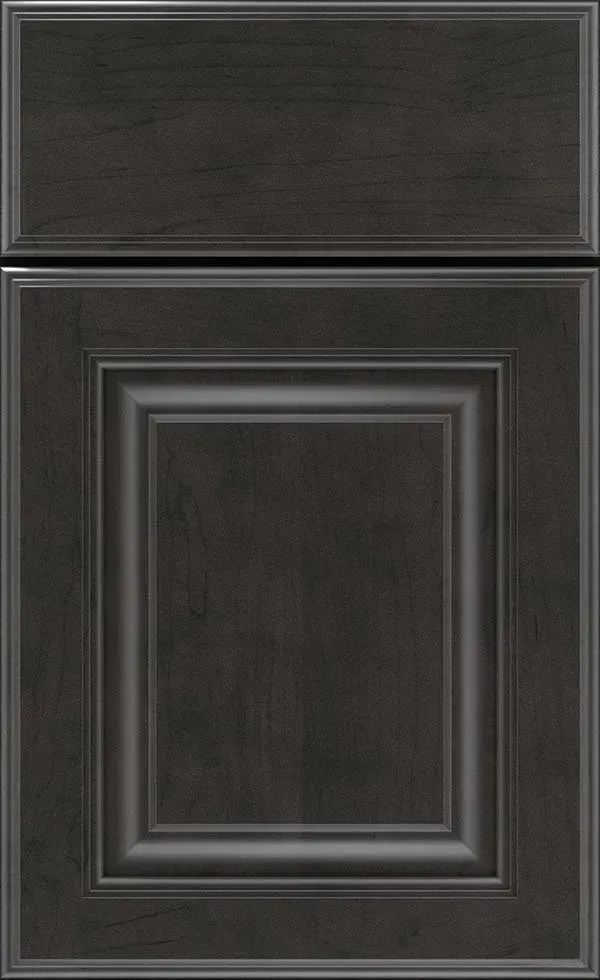 Dark gray cabinet door with recessed panel and decorative trim.