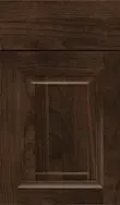 Dark brown wooden cabinet door with raised panel and visible wood grain.