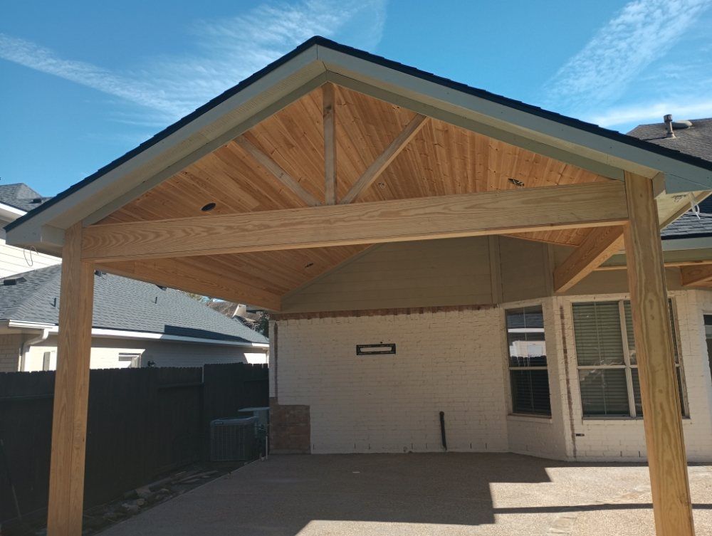 A house with a wooden roof and a wooden porch