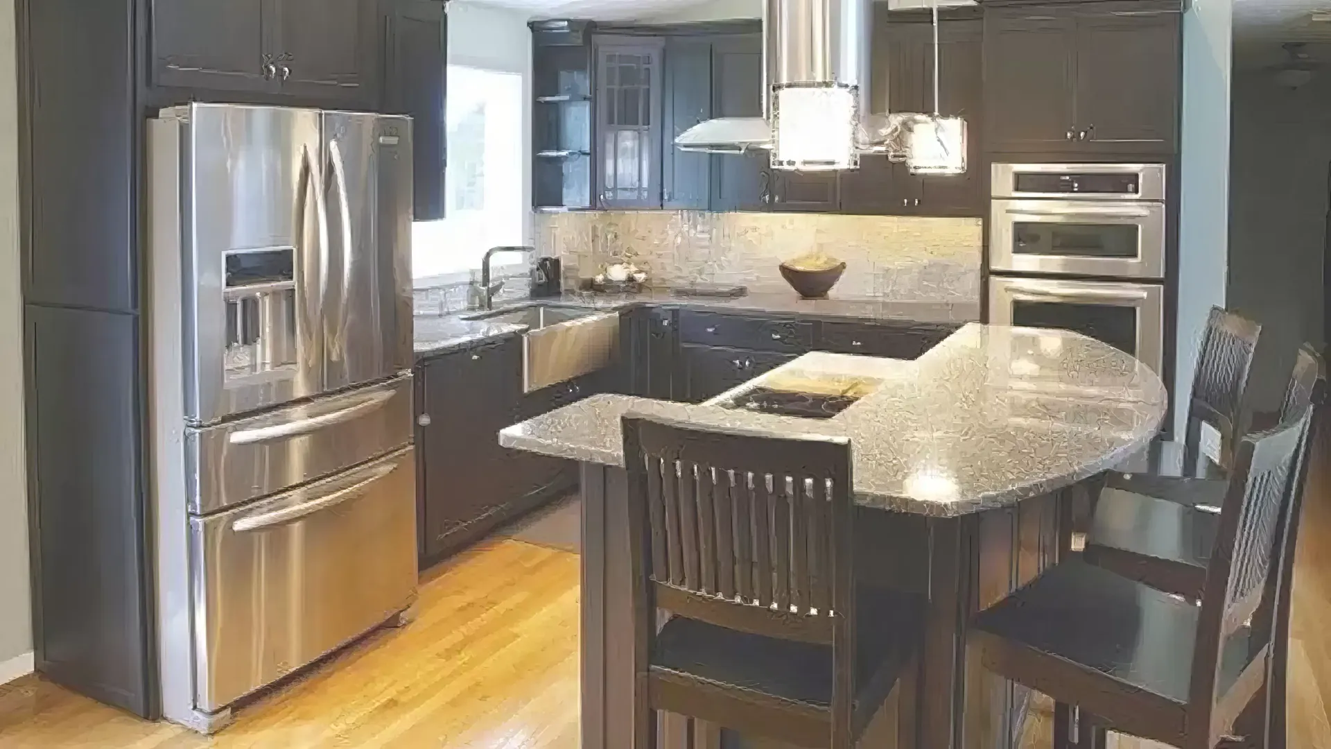 A kitchen with stainless steel appliances and granite counter tops.