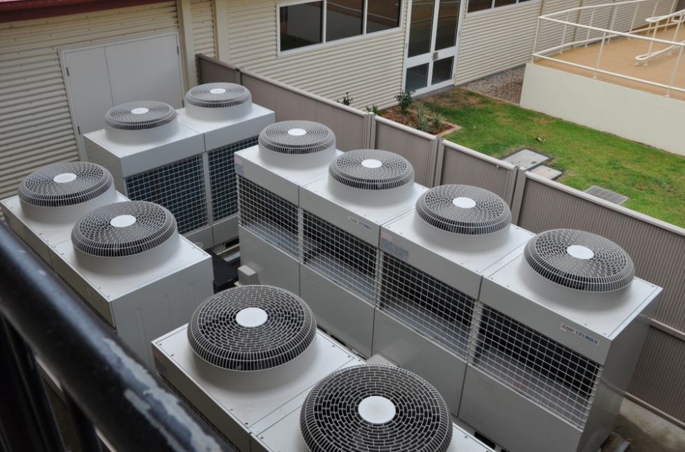 A Bunch Of Air Conditioners Are Sitting On Top Of Each Other — Frigid-Air PTY Ltd In South Lismore, NSW
