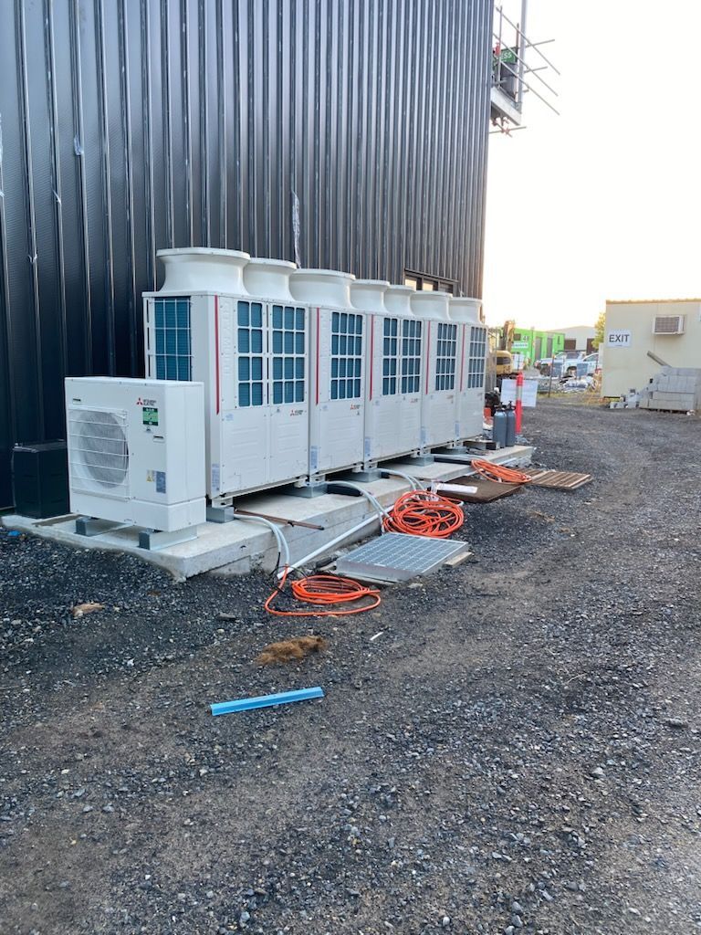 A Large Set Of Air Conditioning Units Outside A Shed — Frigid-Air PTY Ltd In South Lismore, NSW