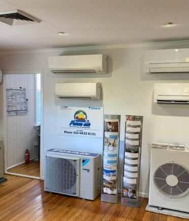 A Room With A Lot Of Air Conditioners On The Wall — Frigid-Air PTY Ltd In South Lismore, NSW