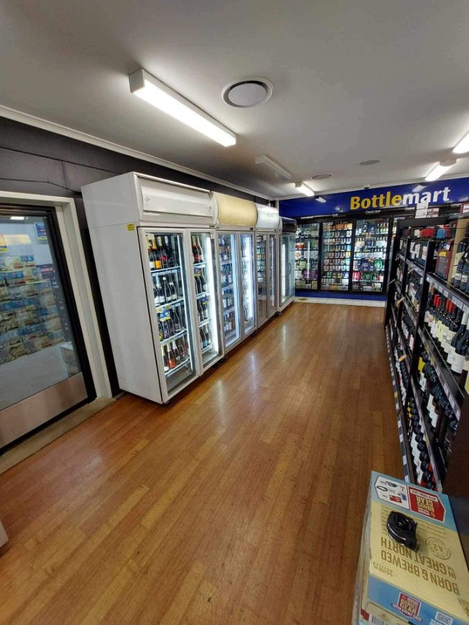 The Inside Of A Liquor Store With A Lot Of Fridges And Shelves — Frigid-Air PTY Ltd In Evans Head, NSW