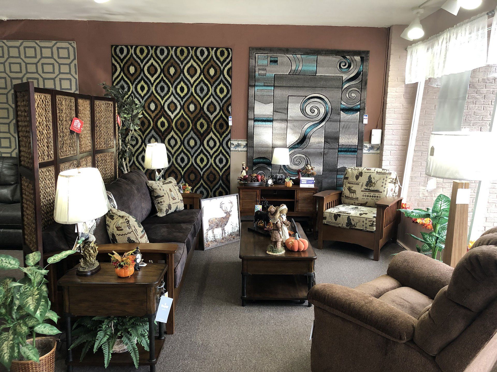 area rugs, end tables, and decorative pumpkins