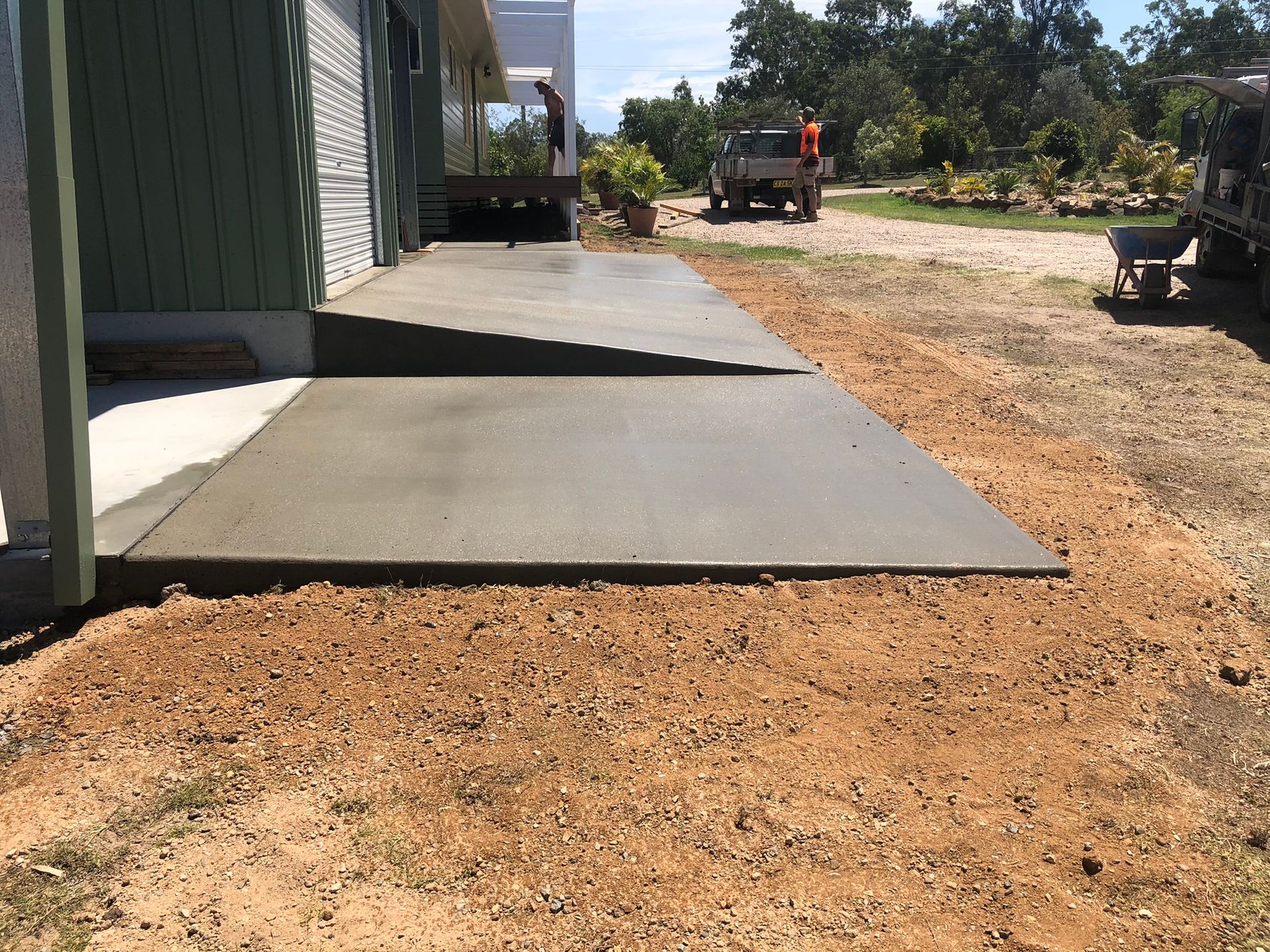 A House Under Construction With a Gravel Driveway Leading to It — Grafton Concreting & Bobcat Services In South Grafton, NSW