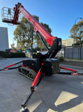 Red and black tracked spider lift Elevated Work Platform (EWP) rental in Melbourne. View this Man Lift or Boom Lift at Scaffactive.com.au.