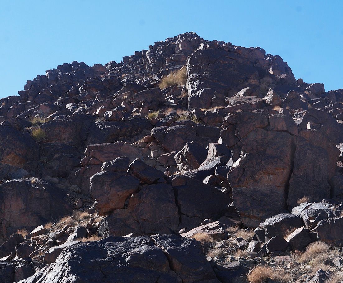 Black basalt rock on peak of Real Mount Sinai