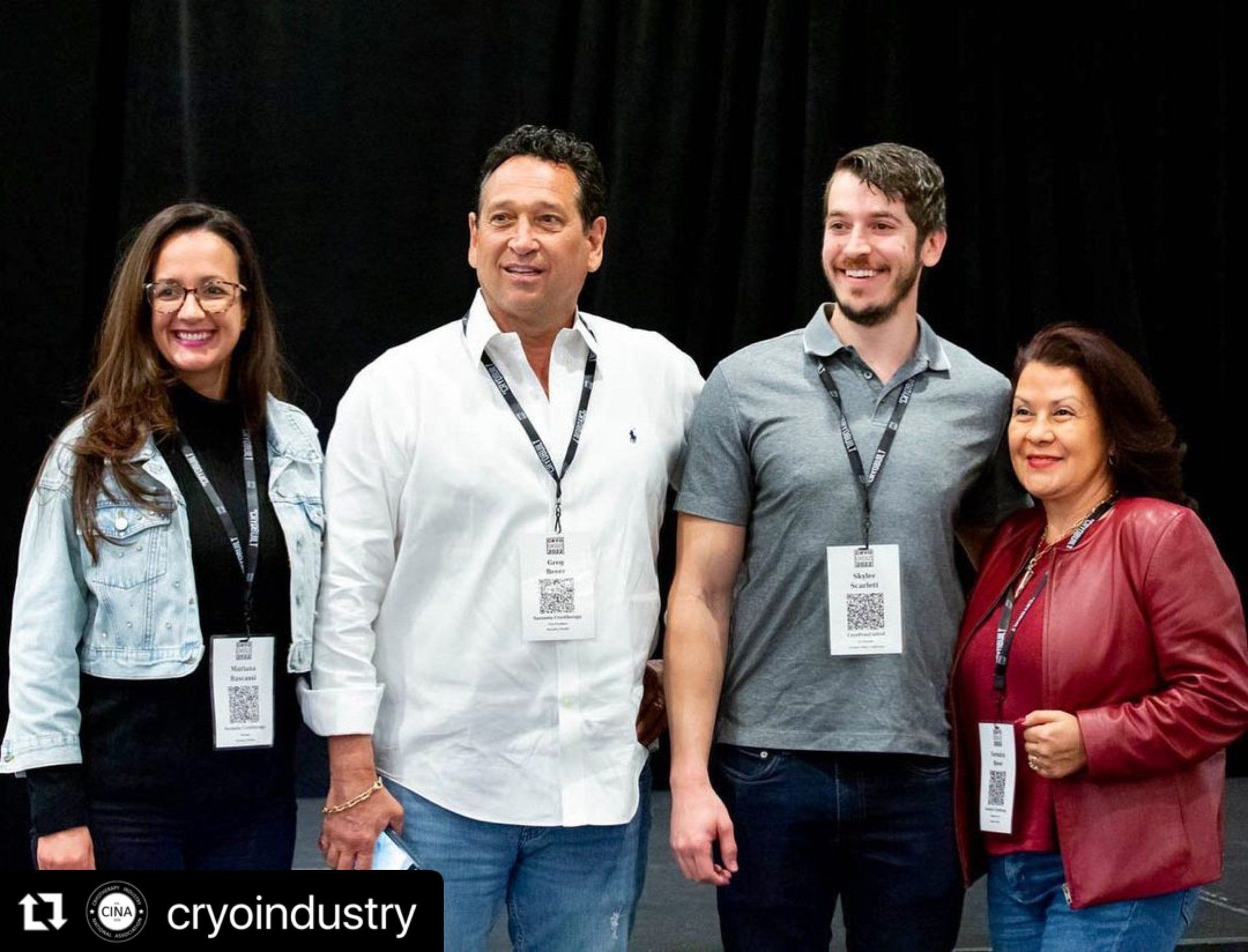 A group of people are posing for a picture together.