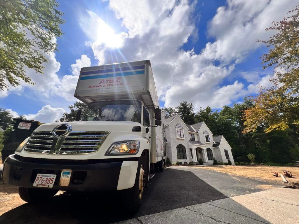 Moving Truck Near Residential Home | West Springfield, MA | A to Z Moving & Storage