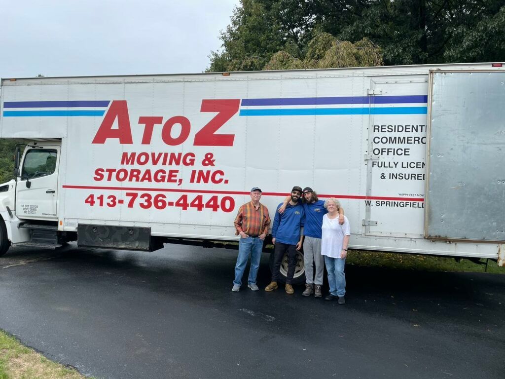 People Standing in Front of Truck | West Springfield, MA | A to Z Moving & Storage
