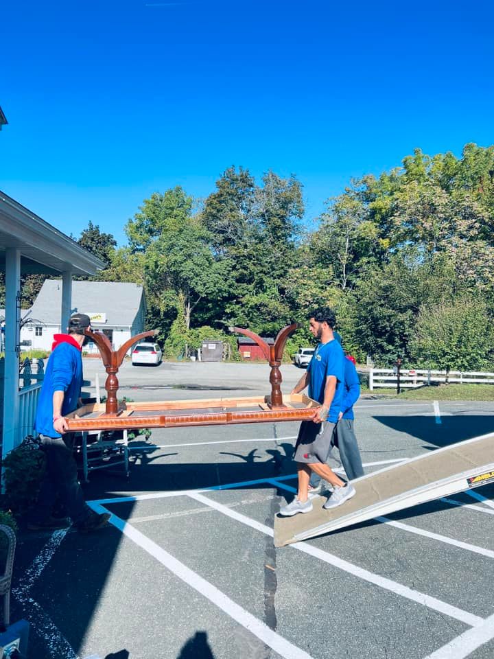 Men Carrying Table on Ramp | West Springfield, MA | A to Z Moving & Storage