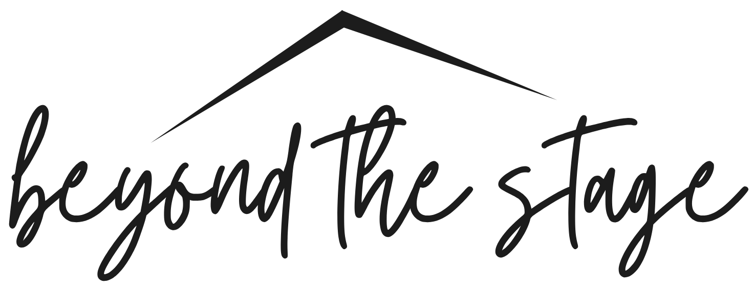 A black and white logo for beyond the stage with a roof.