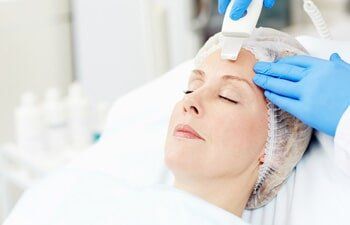 Skin Tightening Treatment — Woman Having a Treatment in Slidell, LA