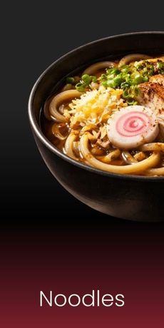 A black bowl of hot udon noodles topped with narutomaki, green onions, and tempura bits against a dark red gradient.