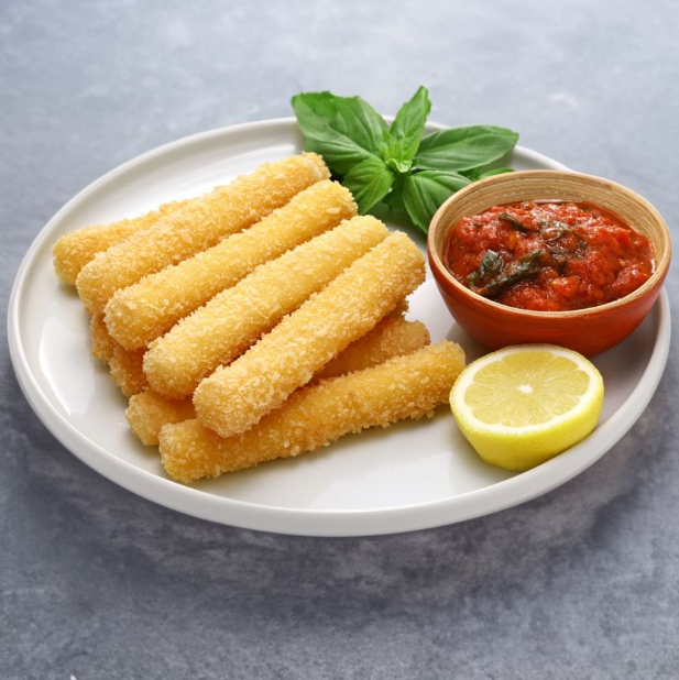 Fried mozzarella sticks with marinara sauce and lemon on a plate.