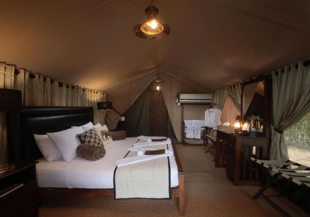 There is a large bed in the middle of the room.