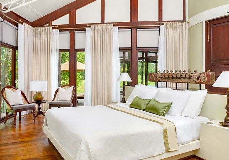 There is a large bed in the middle of the room.