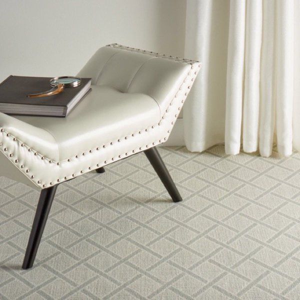 A white chair with a book on top of it