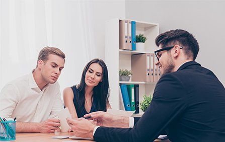 International Transaction Law — Happy Young Couple On Consultation in Duluth, GA International Transaction Law — Happy Young Couple On Consultation in Duluth, GA