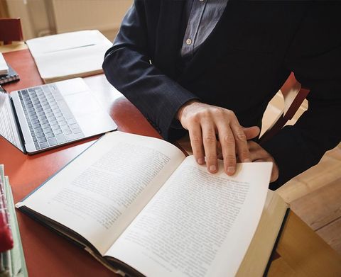 Divorce Attorneys Duluth Ga — Lawyer Reading A Book in Duluth, GA
