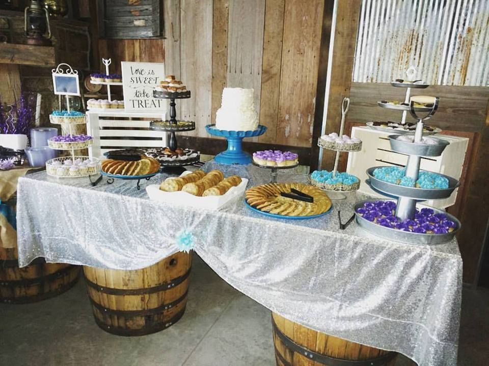 There is a table with a lot of food on it.